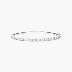 14K White Gold Abyss Lab-Created Diamond Bangle Bracelet. She'll love the anytime appeal of this classic bangle bracelet. Fashioned in 14K white gold, this look showcases a row of lab-created diamonds - each and a brilliant buffed luster, this bangle secures with a single snap clasp. Minimalist White Sterling Silver Bangle Bracelet, Minimalist White Sterling Silver Bangle, Classic White Gold Cuff Bracelet With Brilliant Cut, Stackable White Gold Diamond Bangle, Stackable White Gold Diamond Bangle Bracelet, White Gold Stackable Diamond Bangle Bracelet, White Diamond Bangle Bracelet Fine Jewelry, Stackable White Gold Bangle Bracelet, White Gold Stackable Bangle Bracelets