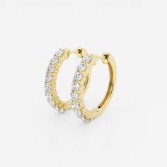 Who doesn't like a pair of classic hoop earrings? This extremely versatile pair can be worn with jeans and a tee, a cocktail dress or at your summer soiree. The high quality lab-grown diamonds shimmer as you move. Plain White Tee, Pearl And Diamond Earrings, Pearl Diamond, Perfect Engagement Ring, Plain White, High Jewelry, White Tee, Conflict Free Diamonds, Round Cut Diamond