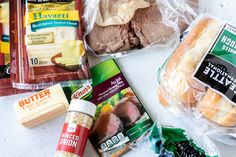 the food is laid out on the counter ready to be eaten and put into plastic bags