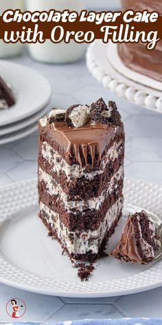 a slice of chocolate layer cake with oreo filling