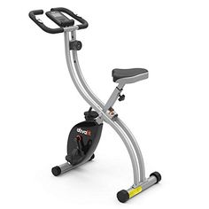 an upright exercise bike with seat and handlebars on the front, side view