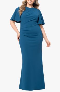 Soft ruching shapes the silhouette of this striking gown designed with a V-dipped back and fluttering sleeves that end at the elbow. 59 1/2" length; 6" train (size 18W) Hidden back-zip closure Bateau neck V-back Elbow-length sleeves Lined, except sleeves 94% polyester, 6% spandex Dry clean Made in the USA of imported fabric Fitted Maxi Dress With Cape Sleeves For Evening, Fitted Flutter Sleeve Evening Dress For Wedding, Fitted Dresses With Sweep Train And Cape Sleeves, Stretch Flutter Sleeve Party Dress, Stretch Flutter Sleeve Dress For Party, Elegant Flutter Sleeve Evening Dress For Gala, Fitted Maxi Gown With Draped Sleeves, Party Dress With Flutter Sleeves And Stretch, Elegant Ruched Maxi Dress With Flutter Sleeves