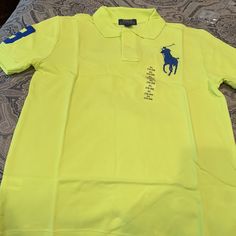 Nwt Size 18-20 Boys Vibrant Yellow With Royal Blue Horse And Number 3 On Right Sleeve Yellow Short Sleeve Polo Shirt For Spring, Sporty Yellow Short Sleeve Polo Shirt, Sporty Yellow Polo Shirt With Short Sleeves, Yellow Sporty Cotton Polo Shirt, Yellow Cotton Sporty Polo Shirt, Blue Horse, Ralph Lauren Boys, Number 3, Ralph Lauren Shirt