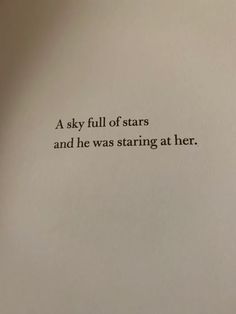 an open book with the words a sky full of stars and he was staring at her