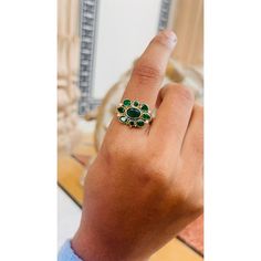 This is part of Chairish’s Fine Jewelry assortment.  Emerald ring in 14K Gold which perfectly goes with your personality and also helps you to improve your creativity. Designed with emeralds and diamonds that makes it a perfect fit to wear it on your wedding, occasions or style it with any of your basic outfit to give it a glam. This gorgeous ring is a great bridesmaid, wedding or christmas gift for anyone on your list.  PRODUCT DETAILS :-  Material - 14K Solid Yellow Gold Gemstone - Emerald Gem Green Multi-stone Oval Diamond Ring, Luxury Multi-stone Emerald Cut Emerald Ring, Green Oval Multi-stone Diamond Ring, Oval Green Multi-stone Diamond Ring, Green Multi-stone Diamond Ring, Luxury Green Multi-stone Emerald Ring, Green Emerald Cut Multi-stone Diamond Ring, Emerald Cut Green Multi-stone Diamond Ring, Emerald Cut Green Diamond Ring With Multi-stone