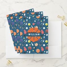 three personalized greeting cards with colorful sports items on them, one is for the basketball team