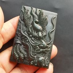 Chinese antiquity style dragon Carved Amulet Jade Pendant, 1.Material: natural black green jade stone bead, top with pass hole 2.Size of bead:approx 59mmx38mmx9mm   in size.   3. this price is 1pendant. 4. fit make earring /brooch/pendant/necklace ect jewelry, 5.If you have speical requests, I'll be happy to do it for you. 6.Returns:I accept returns. 1)Send me an email within 7 days and let me know the item is being returned. 2)I will refund your money after we recieve our merchandise. 3)Precond Chinese Dragon, Jade Stone, Jade Pendant, Green Jade, How To Make Earrings, Jade Green, Stone Pendant, Necklace Pendant, Black Green