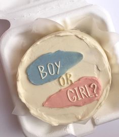 a cake with the words boy or girl on it in an egg carton,