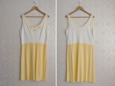 "Super sweet pastel yellow sleep dress/ nightie with floral lace detailing. So adorable! Condition: Excellent. Ready to wear. Very light fabric imperfection due to nature of the natural fabric. Material: Viscose Size: No tag, estimated modern size - M, EUR 40-42, UK 12-14, USA 8-10 Measurements (laying flat and doubled): Bust: 39.3\"/ 100 cm Waist: 33\"/ 84 cm Hips: 40.55\"/ 103 cm Length (shoulder to hem): 40\" / 102 cm Color of product may vary compared to photo due to lighting. Please measure Yellow Summer Sleep Dress, Cream Nightgown For Summer, Yellow Spring Dresses For Loungewear, Cream V-neck Sleepwear For Summer, Yellow Loungewear Dresses For Spring, Spring Yellow Nightgown For Loungewear, Yellow Summer Loungewear Dress, Fitted Cream Sleepwear For Summer, Yellow Summer Nightgown For Sleep