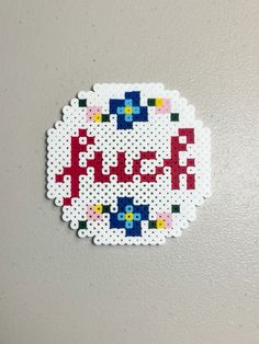 a piece of art made out of perler beads