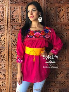 This Beautiful Mexican blouse is embroidered by Cross Stitch and has colorful florals embroidered around the collar. Please note: This blouse comes in one size which fits sizes Small, Medium and Large. You have the option of purchasing the blouse with the belt for a special price or the blouse on its own. The Jewelry modeled may be purchased separately in another post. Multicolor Embroidered Folk Blouse With Boho Collar, Folk Style Floral Embroidered Blouse For Fiesta, Fiesta Floral Embroidery Blouse, Traditional Embroidered Multicolor Peasant Top, Traditional Embroidered Fiesta Blouse, Mexican Top, Frida Kahlo Style, Mexican Textiles, Smock Blouse