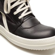 Rick Owens Geobasket High-Top Sneakers Designer's ID: RU01B1894-LPO These black and white Geobasket sneakers from Rick Owens are a must-have for the stylish man. The geometric details on the leather upper give these sneakers a unique look, while the side zip closure makes them easy to put on and take off. Plus, the TPU sole provides durability and support. Composition: Leather Made in ITALY Rick Owens Geobasket, Stylish Man, Wedge Sneaker, Lace Closure, Rick Owens, Stylish Men, Sneakers Black, Put On, High Top