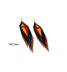 Red black earrings Unusual earrings Statement earrings Geometric earrings Fire earrings Red yellow earrings African earrings Ankara earrings Long dangle earrings Beaded earrings Hippie earrings Fringe earrings Seed bead earrings These elegant and fieric earrings made of high-quality Czech beads. They have a metal hook with gold plating. These earrings are not authentic African earrings, but are made according to my author's design. Colors: Black + Red + Yellow + Gold Length of the Earrings - 5.5 Ankara Earrings, Fire Earrings, African Earrings, African Ankara, Unusual Earrings, Hippie Earrings, Feather Jewelry, Making Earrings, Earrings Geometric