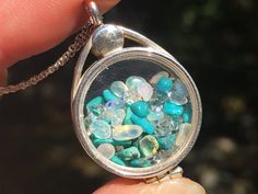 Ethiopian Opal, Turquoise, and Herkimer Diamond Quartz Crystal Sterling Silver Floating Locket on Si Round Turquoise Locket Jewelry, Turquoise Round Locket Jewelry, Spiritual Turquoise Gemstones For Gift, Turquoise Round Pendant Locket Jewelry, Turquoise Opal Jewelry As A Gift, Turquoise Opal Jewelry As Gift, Turquoise Multi-stone Gemstones For Gifts, Turquoise Opal Jewelry For Gift, Sterling Silver Locket