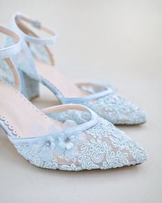 "Crochet Lace Wedding Shoes Collection. Classic and refined almond toe crochet lace with added flower appliques. The perfect shoe for a spring or summer wedding, bridesmaids, bridal party, or any special occasions. The light blue color can easily be your something blue. DETAILS: HEEL HEIGHT: 2.75 inches COLORS AVAILABLE: Ivory, White and Light Blue UPPER: Synthetic upper and lining MATERIALS: Manmade outsole STYLE NAME: ABBY  SIZE FIT: RUNS LARGE  Not sure of which size to purchase? Shoes measur Summer Wedding Bridesmaids, Block Heels Wedding, Lace Wedding Shoes, Blue Bridal Shoes, Bridal Shoes Low Heel, Ivory Bridal Shoes, Flower Girl Shoes, Wedding Shoes Lace, Pointy Toe Flats