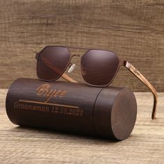 "PRODUCT INFO: * Personalized classic unisex wooden aviator sunglasses and an optional bamboo sunglasses box * Front frame is made of metal (not full wooden sunglasses); temples are made of zebrawood; smooth finish; light weight * With spring hinges, they fit most of the faces comfortably * Free engraving on temples (can be done on left or right or both sides) and box * Great keepsake gifts from different occasions, such as birthday, wedding, xmas etc Unique groomsman gifts are available in my s Groomsmen Watches, Groomsmen Gifts Unique, Wedding Sunglasses, Engraved Wooden Boxes, Groomsmen Gift Set, Wooden Glasses, Personalized Sunglasses, Sunglasses Box, Bamboo Sunglasses