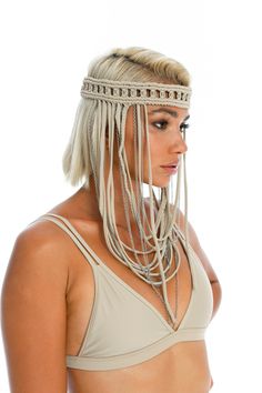 DESCRIPTION Oracle Dawn Headpiece. A dreamy festival headpiece. Hand-crafted macrame embellished with silver beads and chain. This stunning headpiece comes with the added feel-good factor of being a Ladee Taha zero waste treasure. - Fabric: Recycled ECONYL® nylon lycra. - Hand-crafted macrame. - Silver hardware. SIZE GUIDE: 1 size fits all with adjustable stretchy ties. Styled with our Ocean triangle bralette | Dreamers top | Dreamers mini skirt | Mella crochet dress. SHOP ALL: Ladee Taha treasu Burning Man Fashion Woman, Macrame Crown, Macrame Veil, Macrame Fashion, Macrame Headband, Rope Dress, Fashion Costume Halloween, Macrame Jewellery, Chain Headband