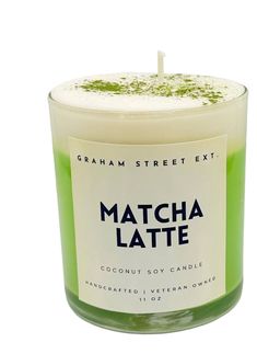 matcha latte candle with green liquid in front of a white background and the words matcha latte written on it