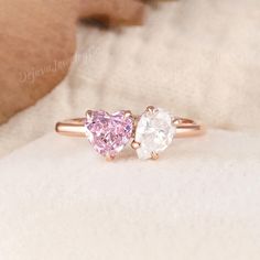 Gorgeous Hidden Halo Toi Et Moi Ring with Heart-Shaped Pink Sapphire and Pear Shape Lab-Grown Diamond in Rose Gold. This IGI Certified Engagement Ring is a Delightful Gift for Women, Featuring a Two-Stone Design that Celebrates Love. Perfect as a September Birthday Gift or for Adoring Fans of Baby Pink Jewelry. ✦ Handmade, high-quality item ✦ Material: SOLID 10K/14K/18K GOLD ( can be made in yellow/white/rose gold ) ✦Engagement ring ✦ Center stone: 6mm Lab pink sapphire in heart shape; 4*6mm moi Pink Gold Heart Cut Wedding Ring, Pink Gold Heart Cut Rings For Wedding, Heart Cut Pink Gold Wedding Rings, Pink Gold Heart Ring For Valentine's Wedding, Pink Gold Heart Ring For Wedding Or Valentine's Day, Pink Double Heart Ring For Wedding, Pink Double Heart Wedding Ring, Pink Gold Heart-shaped Wedding Ring, Pink Heart Engagement Rings