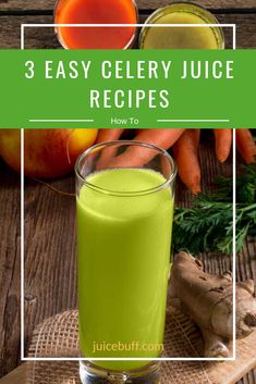 a glass filled with green juice next to carrots and celery