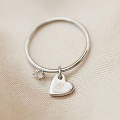 Dainty Personalized Silver Heart Ring, Heart Shaped Initial Ring For Gift, Heart-shaped Initial Ring Gift, Heart Shaped Initial Ring Gift, Personalized Sterling Silver Heart Ring For Valentine's Day, Minimalist Personalized Heart Initial Ring, Rose Gold Sterling Silver Heart Ring With Charm, Initials Engraved Heart Ring For Valentine's Day, Personalized Heart-shaped Sterling Silver Ring