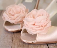 "Dress up your trip down the aisle with these lovely blush peep toe wedges! These 2 1/2\" bridal heels (measured like this: http://www.customweddingshoe.com/how-heel-height-is-measured.html) are done in blush satin with a handmade flower in layers of organza and satin. Color Change: Want this shoe in a different color? We can change the base shoe color for you! To order this shoe in a different color, please send us a CUSTOM REQUEST. To view our catalogue of colors, please visit our website at: Elegant Pink Wedding Shoes For Bridal Shower, Pink Open Toe Heels For Wedding, Spring Wedding Pink Shoes, Spring Pink Wedding Shoes, Blush High Heels For Wedding, Pink Low Heel Wedding Shoes, Rose Gold Open Toe Heels For Wedding, Blush Feminine Heels For Wedding, Pink Closed Toe Wedding Shoes