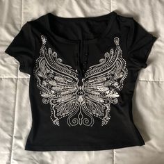 Black Cropped Top With Butterfly Casual Black Tops With Butterfly Print, Casual Black Top With Butterfly Print, Black Tops With Butterfly Print For Spring, Fitted Black Top With Butterfly Print, Black Cropped Top, White Crop Blouse, High Neck Crop Top, Satin Crop Top, Graphic Crop Top