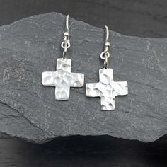 "Sterling silver french hook Hammered Cross earrings that dangle. The cross symbolizes hope and faith. - The cross charm measures 5/8\" tall - All jewelry parts are 925 solid sterling silver Gift Box Included - Send gifts direct! A short gift note may be added at checkout. Receipts not included.   🦋 Visit the shop! https://www.etsy.com/shop/TheZenMuse  About Quality The quality and safety of sourced sterling silver materials are very important to me. I only source materials from reputable compa Silver Cross Earrings, Silver Gift Box, Sterling Jewelry, Christian Jewelry, Modern Square, Cross Earrings, Cross Charms, Hammered Silver, Etsy Earrings Dangle