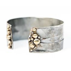 "Gorgeous Statement Cuff Bracelet Hand Made-to-Order just for you! Price of $147 is for any combination of metals. Choose Sterling Silver, Bronze, NuGold or Copper. Choose your width: 1/2\", 1\", 1.5\", 2\" Can be made any length from 6\" to 8\" Free Priority Mail Shipping on all orders over $140" Gold Sterling Silver Cuff Bracelet, Gold Sterling Silver Cuff Jewelry, Modern Hammered Cuff Jewelry, Metal Cuff Bracelet With Polished Finish, Metal Cuff Bangle With Polished Finish, Polished Metal Cuff Bangle, Polished Metal Cuff Bracelet, Unique Metal Wide Band Cuff Bracelet, Elegant Hand Forged Silver Cuff Bracelet