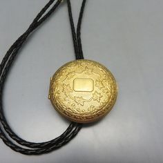 Hand Made Golden Locket Bolo Tie, Victorian Style Working Locket Bolo Tie by PandPF on Etsy Vintage Engraved Lariat Jewelry, Vintage Formal Bolo Tie Lariat, Gold Bolo Ties With Adjustable Cord As Gift, Gold Bolo Ties With Adjustable Cord For Gifts, Adjustable Gold Bolo Tie As Gift, Gold Lariat Bolo Tie With Adjustable Length, Vintage Gold Lariat Bolo Tie, Gold Adjustable Cord Bolo Ties For Gift, Vintage Formal Jewelry With Adjustable Length