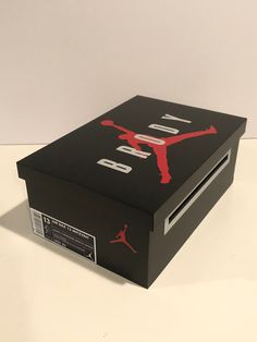 a black box with red and white logos on the side that says jordan do it