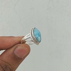 Important : PLEASE ENTER YOUR PHONE NUMBER IN THE "NOTE TO SELLER" SECTION DURING CHECKOUT, SO THAT THE DELIVERY CAN BE HASSLE FREE.Material: Solid Sterling silver Stone: Larimar stone size: varies( According to the ring sizes)ships worldwide from India925 stampedHandmade itemOur products are totally handmade and made with high quality gemstones and 925 solid sterling silver.If you believe in buying top quality products for yourself and for your family and friends, SilverDynasty is the place whe Earth Healing, Larimar Ring, Larimar Rings, Silver Rings With Stones, Inner Wisdom, Larimar Stone, Rainbow Moonstone Ring, Ring Boho, Gem Stones