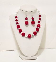 "Red Jewelry, Red Necklaces, Holiday Jewelry, J'NING Jewelry, Special Occasion Jewelry, Elegant Jewelry, Party Jewelry Beautiful red necklace set is perfect for Christmas, holidays or anytime you need that perfect red accessory for your outfit. Necklace measures approx. 17\" long and has a 2\" extender chain.  Earrings drop approx. 2\" from top of ear wire. You can choose earrings with ear wire, post or clip on. Set has red beads with silver accent beads and chain. Lobster clasp" Cheap Red Jewelry With Silver Beads, Elegant Red Necklace For Holiday, Red Round Beads Jewelry For Christmas, Adjustable Red Necklace For Holiday, Red Necklaces For Valentine's Day Festive Occasions, Red Beaded Necklace For Party, Red Necklace For Valentine's Day Festivities, Elegant Red Beaded Necklace For Christmas, Red Christmas Party Necklaces