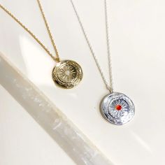 Resilience Amulet - Silver – Gather Brooklyn Celestial Round Necklace For Meditation, Good Luck Medallion Necklace With Coin Pendant, Moon Phase Medallion Necklace In Amulet Style, Moon Phase Medallion Amulet Jewelry, Moon Phase Medallion Necklaces Styled As Amulets, Healing Medallion Locket Necklace, Sterling Silver Amulet Medallion Necklace, Silver Medallion Necklace With Moon Charm, Rituals Medallion Necklace With Coin Pendant