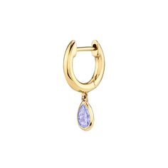 The sweetest yellow gold huggie that hugs tight to the ear is updated with a dash of sparkle by a delicate teardrop shaped tanzanite stone. 14k yellow gold. Light Blue Sapphire, Diamond Huggie Earrings, Tanzanite Stone, Moonstone Stone, Diamond Chain, The Ear, Aquamarine Stone, Garnet Stone, Diamond Hoop Earrings