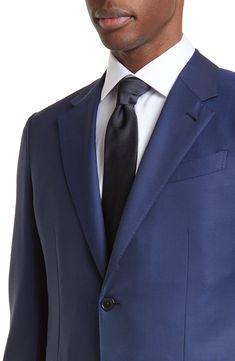 Impeccably tailored from ZEGNA's proprietary, superfine wool fibers, this essential suit boasts a refined micro pattern that adds depth to the classic colorway. Precise pickstitching showcases the label's scrupulous attention to detail. Jacket has notched lapels, four-button cuffs, chest welt pocket, front pocket, side vents Pants have zip fly 100% wool Dry clean Made in Italy Men's Designer Clothing Solid Color Tuxedo With Notch Lapel For Business, Tailored Blue Silk Suit, Solid Suits With Pressed Crease For Business Casual, Blue Silk Suits For Formal Occasions, Tailored Silk Suit For Business Casual, Silk Tuxedo For Business, Classic Silk Suits With Notch Lapel, Classic Silk Three-piece Suit With Suit Collar, Blue Silk Suits For Tailoring