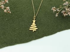 Christmas Tree Necklace in 14K Solid Gold, Gold Pine Tree Pendant, Dainty Charm Necklace, Noel Gifts, Christmas Gift Jewelry, Xmas Necklace -Features- * Made to order * Material: Solid Gold (no gold filled or gold plated material) * Carat: 14K (585) (real gold) * Production Techniques: Handmade and Laser Cut * Package: Jewelry Box This beautiful 14K Solid Gold handmade necklace is the ideal gift for a loved one. Perfect for birthdays, anniversaries, Mother's Day, Christmas and weddings, it truly is extra special and will make whoever receives it feel extra special too.  / WHY YOU'LL LOVE / * Elegant and can be worn every day * A special piece that you can appreciate * High quality 14K Solid Gold and attention to detail Hallmark Necklace For Christmas And Anniversary, Quality Assured Necklace For Christmas Anniversary, Gold Necklaces For Christmas Celebration, Gold Necklace For Christmas Celebration, Christmas Celebration Yellow Gold Jewelry, 14k Gold Necklace As Christmas Gift, 14k Gold Necklace For Christmas Gift, Gold Necklace For Festive Christmas Occasion, Yellow Gold Necklaces For Christmas Anniversary