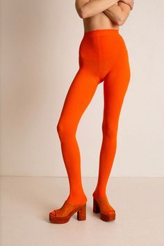 Orange opaque footed 80D tights. Reinforced crotch. Fabric is 84% Nylon, and 16% Spandex. Ella is 6' tall, 36" bust, 27.5" waist, 38" hip, and is wearing a size L/XL. See size chart below. Measurements are taken flat. These tights are extremely stretchy. For more opacity, choose the L/XL. Orange Tights, Color Me Badd, Sale Design, Custom Items, Tights, Size Chart, Spandex, Orange, Fabric