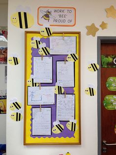 a bulletin board with bees on it