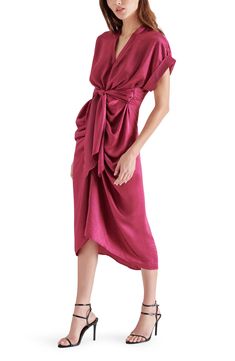 A tie accent highlights your waist in this polished, curve-hugging shirtdress that effortlessly takes your look from the workplace to a dinner date. 41 1/2" length (size 8) V-neck Short sleeves Front button placket 100% polyester Hand wash, dry flat Imported Satin Midi Dress With Tie Waist For Evening, Chic Satin Midi Dress With Tie Waist, Elegant Midi Dress With Tie Fastening, Tie Waist Dress For Date Night, Solid Dress With Tie Waist For Date Night, Elegant Short Sleeve Midi Dress With Tie Waist, Silk Midi Dress With Tie Waist For Work, Elegant Solid Dress With Tie Waist, Fitted Satin Midi Dress With Tie Waist