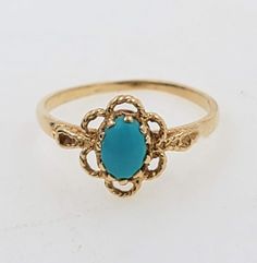 1960 Vintage 14K Solid Yellow Gold 0.25ct Oval Turquoise Flower Milgrain Ring December Birthstone Ring size: 6 (sizeable upon request)  Turquoise weight approx: 0.25ct Turquoise measurements: 7x5 mm Ring weight approx: 1.5 g Hallmark: 14k Front band ring measures approx:  9.9mm Band width: 1.1mm Will be placed into a suitable gift box  Free shipping within the U.S. Gold Oval Hallmarked Turquoise Ring, Antique Oval Turquoise Ring Hallmarked, Vintage Yellow Gold Turquoise Ring Hallmarked, 14k Gold Turquoise Oval Rings, Antique Oval Turquoise Ring For Wedding, Oval Turquoise Rings In 14k Gold, Antique Oval Turquoise Wedding Ring, Vintage Yellow Gold Turquoise Cabochon Ring, Vintage Yellow Gold Turquoise Ring For Formal Occasions