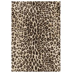 an animal print rug with brown spots on it