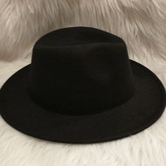 Beautiful Fedora Hat New. Good For Any Occasion And Great For A Gift . This Fedora Hat Is Breathable, Lightweight And Comfortable For All Day. Material : 65% Cotton , 35% Polyester And Has An Adjustable Strap Inside. Hat Circumference :About 58- 60cm/ 22.8"- 23.6" Brim Width : About 8cm/ 3.15 Height : 12cm/ 4.73" Black Casual Felt Hat For Party, Adjustable Black Felt Bucket Hat, Casual Black Felt Hat For Party, Black Fedora For Beach Fall Season, Casual Black Felt Hat For Summer, Black Casual Felt Hat One Size, Black Casual Felt Hat, Casual Black Felt Hat One Size, Black Casual Felt Hat One Size Fits Most