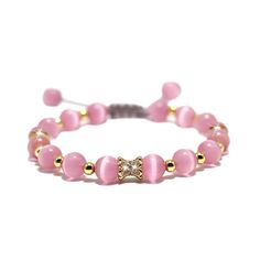 PRICES MAY VARY. Natural: This pink cat's Eye bracelet is handcrafted from authentic natural gemstone beads of high quality with hand-woven adjustable cord, odorless, lead-free, nickel-free and durable Healing Gemstone: The cat's eye is a symbol of inner peace. It exudes gentle energy that helps balance emotions, reduce stress, improve intuition and insight, stimulate creativity and inspiration, and help people face life's challenges with more confidence and optimism Size and Packaging: Beads are approximately 8mm in diameter, the bracelet has an adjustable inner diameter of 7 to 9.5 inches and is packaged in a high-end 3D levitating jewelry case Best Gift: This exquisite bracelet is wrapped in a high-end 3D floating jewelry case, making it a great gift for him/her Guarantee: HANDFCJH JL p Adjustable Rose Quartz Jewelry With 8mm Beads, Adjustable Rose Quartz Beaded Jewelry, Adjustable Bracelets With Round Beads As Gift, Adjustable Round Beads Bracelet As Gift, Rose Quartz 8mm Bead Jewelry As Gift, Rose Quartz 8mm Beads Jewelry Gift, Hand-strung Pink Jewelry For Gifts, Hand Wrapped Rose Quartz Beaded Bracelet As Gift, Adjustable Healing Jewelry Gift