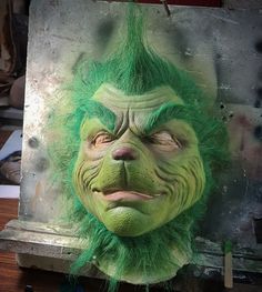 Grinch mask. Handmade from sculpture, reproduction to painting and hair application. Materials: latex and cold foam. The color may vary slightly because it is hand painted. Diver only with front hair, not full head Does not include full costume. Size L Grinch Mask, Cold Foam, Front Hair, Adult Costumes, Grinch, Santa Claus, Beauty Book, Gender Neutral, Spain