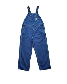 Check out this item in my Etsy shop https://www.etsy.com/listing/1237868038/carthartt-medium-darkwash-blue-overalls Vintage Jean Overalls, Blue Shortalls With Pockets, Blue Denim Overalls With Bib Front, Denim Blue Utility Overalls With Bib Front, Blue Utility Overall Jeans, Denim Blue Bib Front Overalls, Blue Utility Bib Front Overalls, Blue Utility Bib Front Bottoms, Blue Utility Overalls With Bib Front