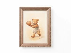 a painting of a teddy bear with a basketball in it's hand is hanging on the wall