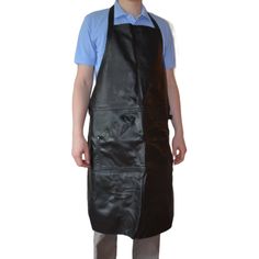 a man wearing an apron and blue shirt