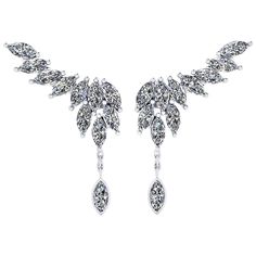 FERRUCCI 2.75 carats Marquise shape Diamonds wing earrings made in 18k white gold in New York City by Italian master jeweler and designer Francesco Ferrucci, modern stylist look for every sophisticated woman of every age, pret-a-porter, easy to wear from office to evening out. A touch of fine sparkle conceived with a drop of marquise diamond dangling to catch light and movement, only for a special woman. Bring light to your life Marquise Shape Diamond, Gold Wing, Diamond Star, Wing Earrings, White Gold Earrings, Marquise Diamond, Gold Earrings Dangle, Elegant Earrings, Star Earrings