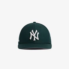 the new york yankees cap is shown in green and white